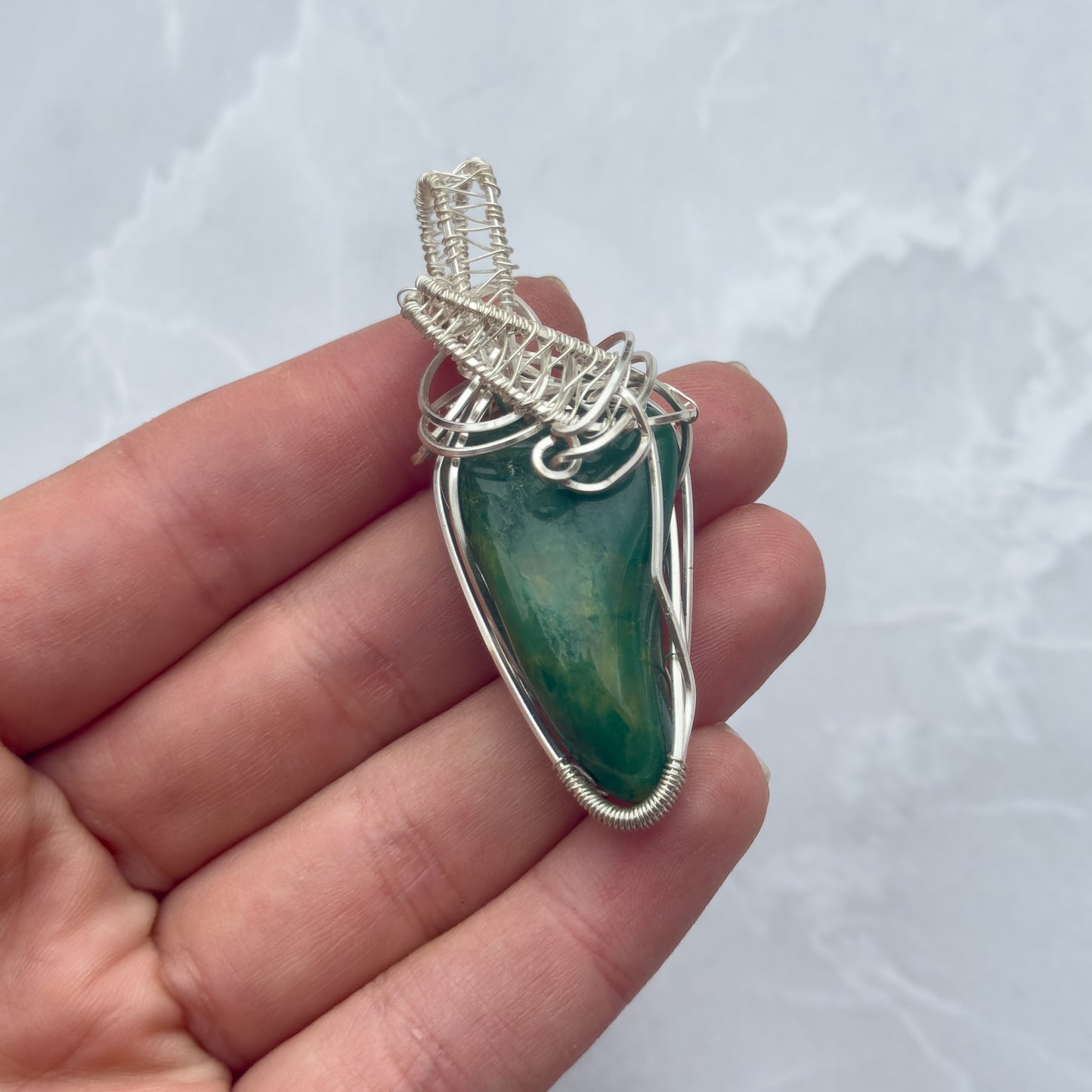 Handmade silver wire wrapped Fuschite pendant