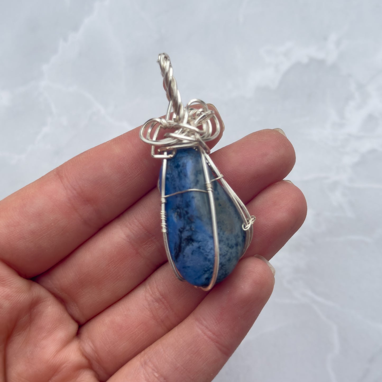 Handmade silver wire wrapped unknown blue stone pendant