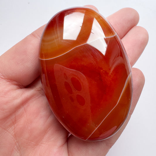 A Grade Banded Carnelian Palmstone